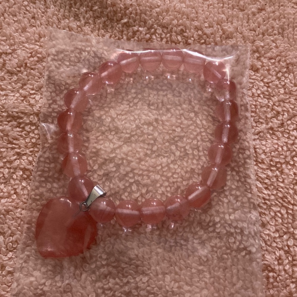 Pink bracelet. Beautiful color. Color looks different, but the same.
